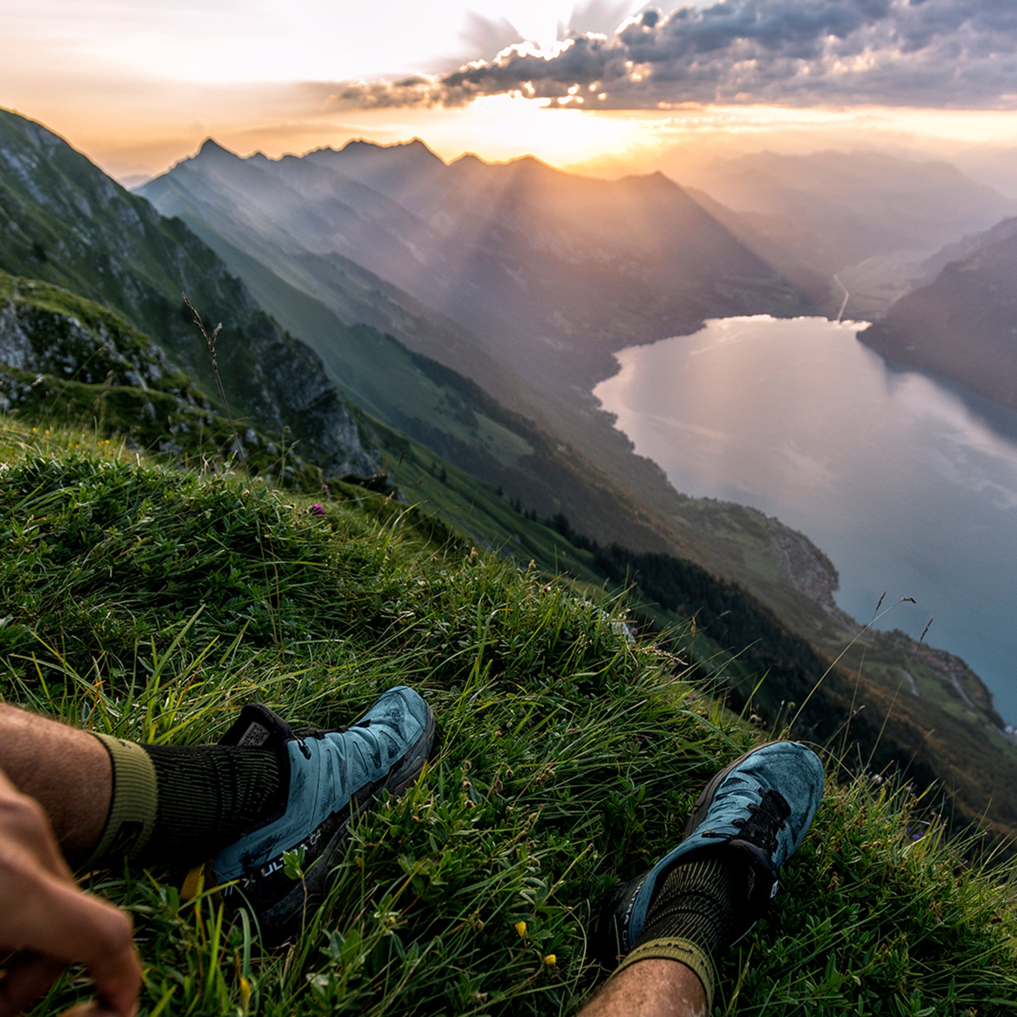 Salomon Sports X ULTRA 4 hiking footwear showing durable gray and black trail shoes with sturdy soles and breathable mesh upper.