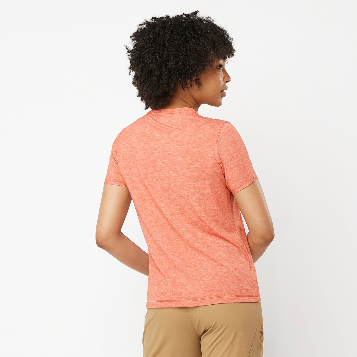 Salomon Sports Essential TENCEL apparel in soft, breathable fabric, showcased in a close-up image.
