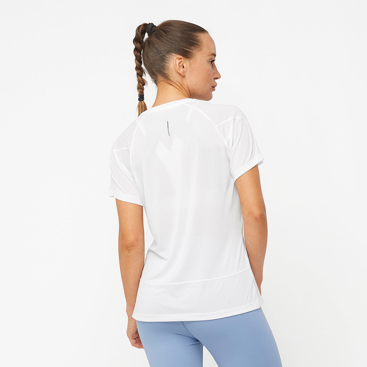 Salomon Sports CROSS RUN apparel in black, lightweight athletic clothing with breathable fabric and reflective details.