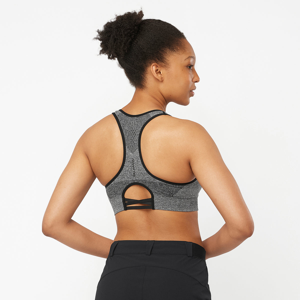 Salomon Sports ELEVATE MOVE'ON athletic apparel, featuring lightweight, breathable fabric for active movement and comfort.