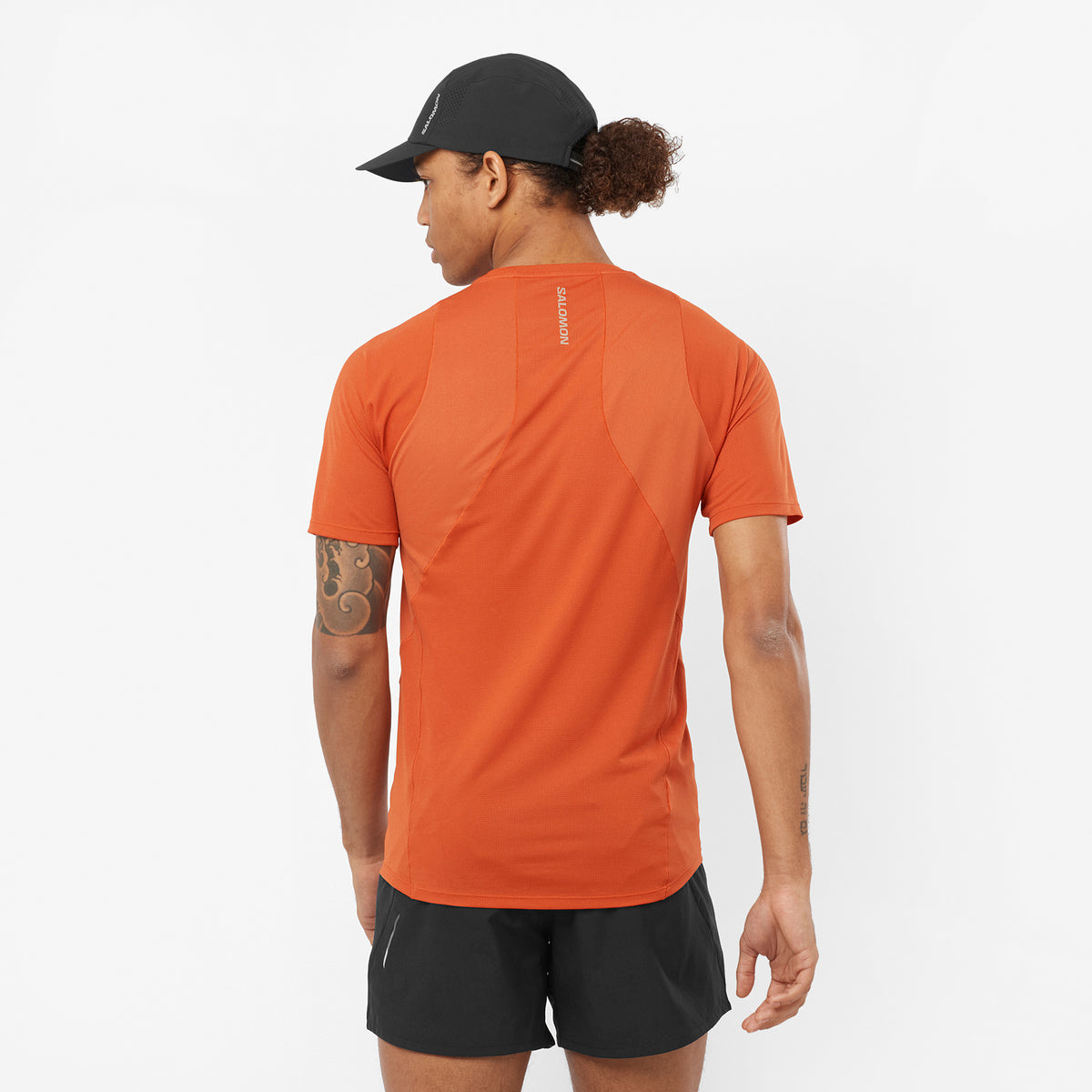 Salomon Sports SENSE AERO apparel, lightweight and breathable sportswear, shown in the image with sleek design and technical fabric.