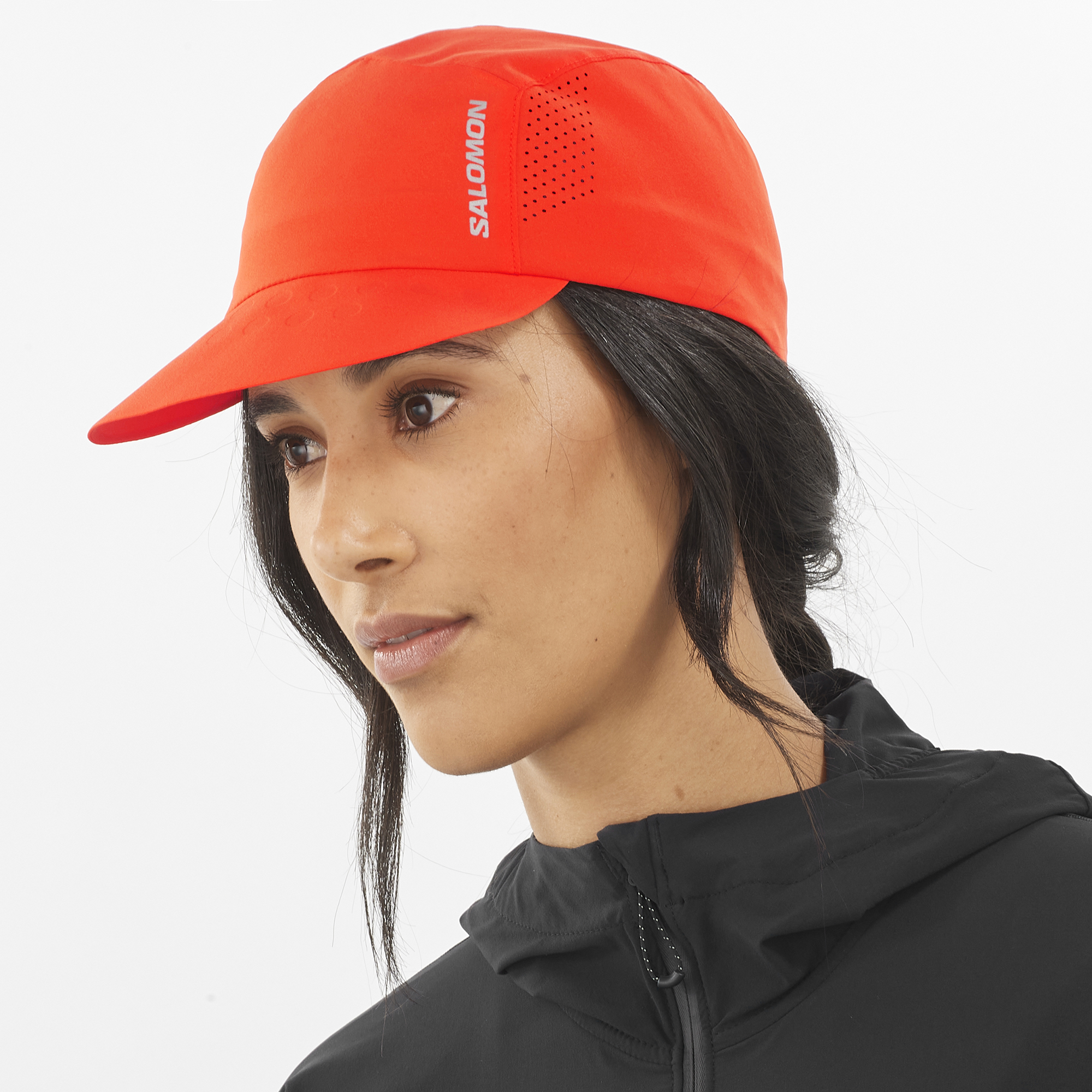 Salomon Sports Cross Compact accessory cap in cherry tomato color, shown from front view with adjustable strap.