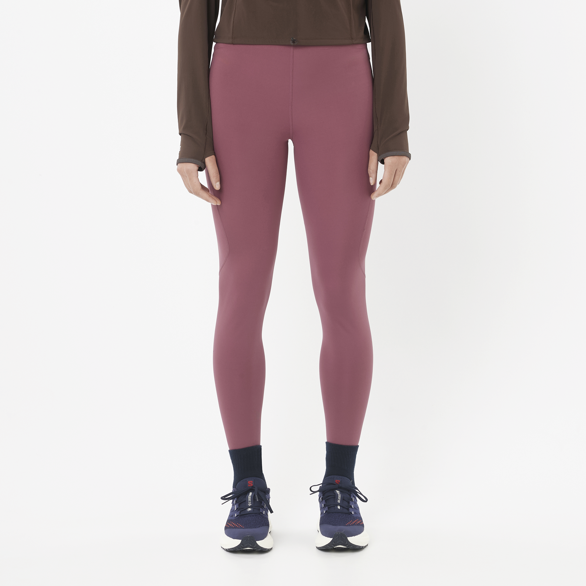 Salomon Sports Shakeout Core 28-inch running tights in nocturne color, close-up of fitted athletic apparel for women.