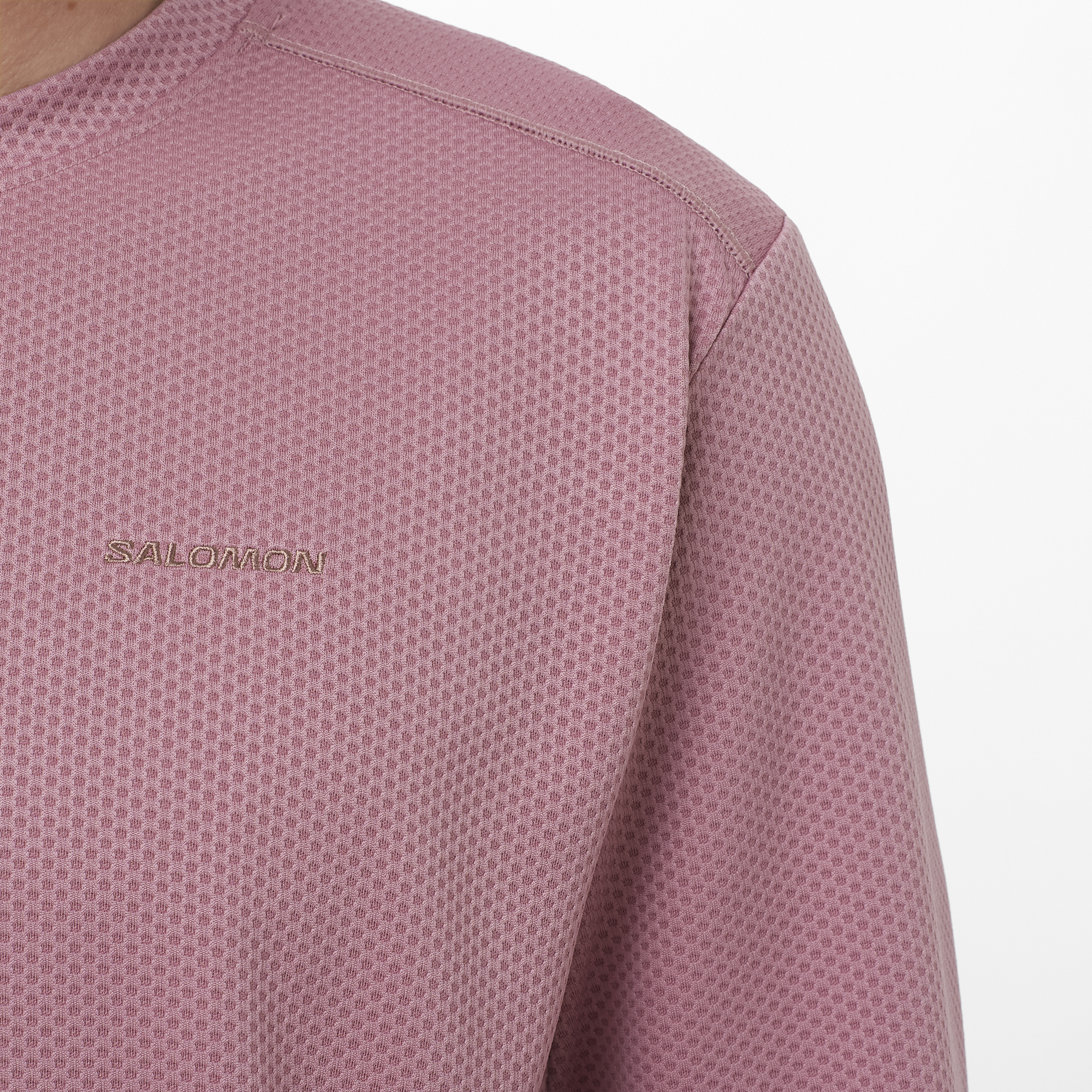 Salomon Sports Motomesh crewneck in dusky orchid, lightweight apparel with breathable mesh fabric for hiking and outdoor activities.
