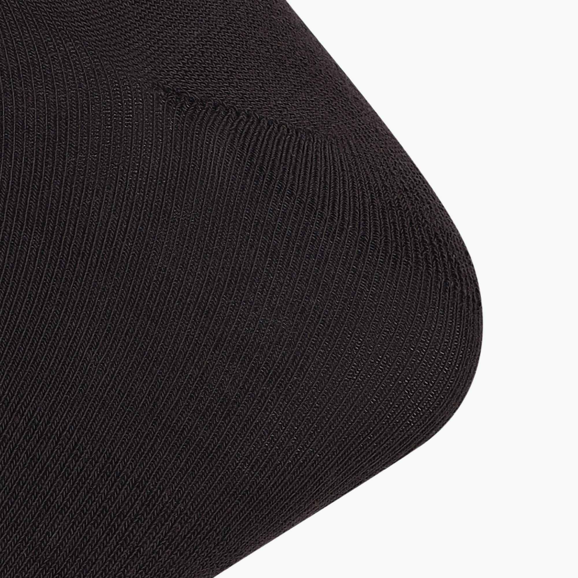 Salomon Sports Pulse ankle sock in black, soft breathable fabric, designed for comfort and athletic performance.