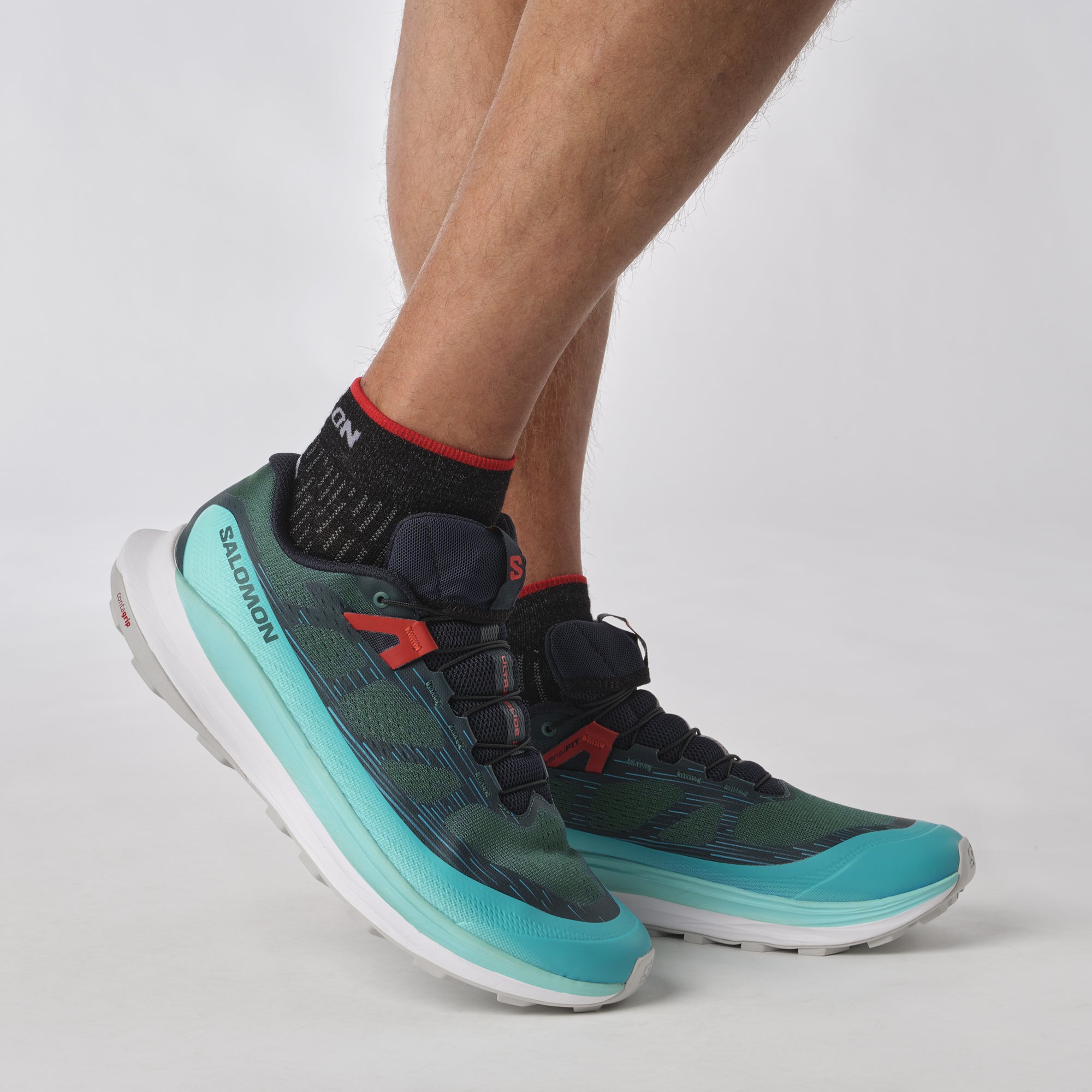 Salomon Sports Ultra Glide 2 footwear showing sleek design and comfort features in a close-up image.
