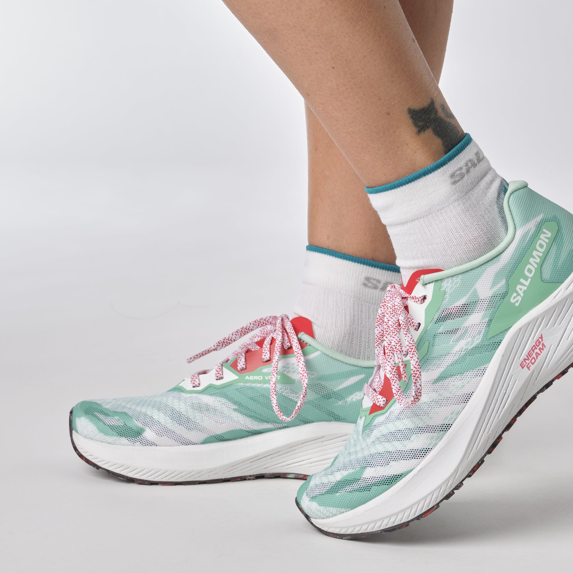 Salomon Sports Aero Volt footwear showing sleek design and breathable material, ideal for outdoor activities and running.