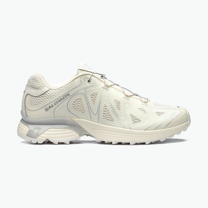 Salomon Sports XT-WHISPER VOID footwear showing a sleek, lightweight trail running shoe with a white and black design.