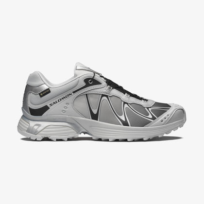 Salomon Sports XT-WHISPER GORE-TEX footwear, waterproof hiking shoes with durable design and breathable Gore-Tex material.